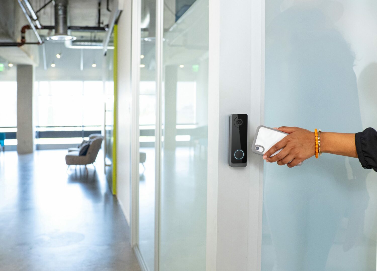 Woman using Phone to open openpath Access Control